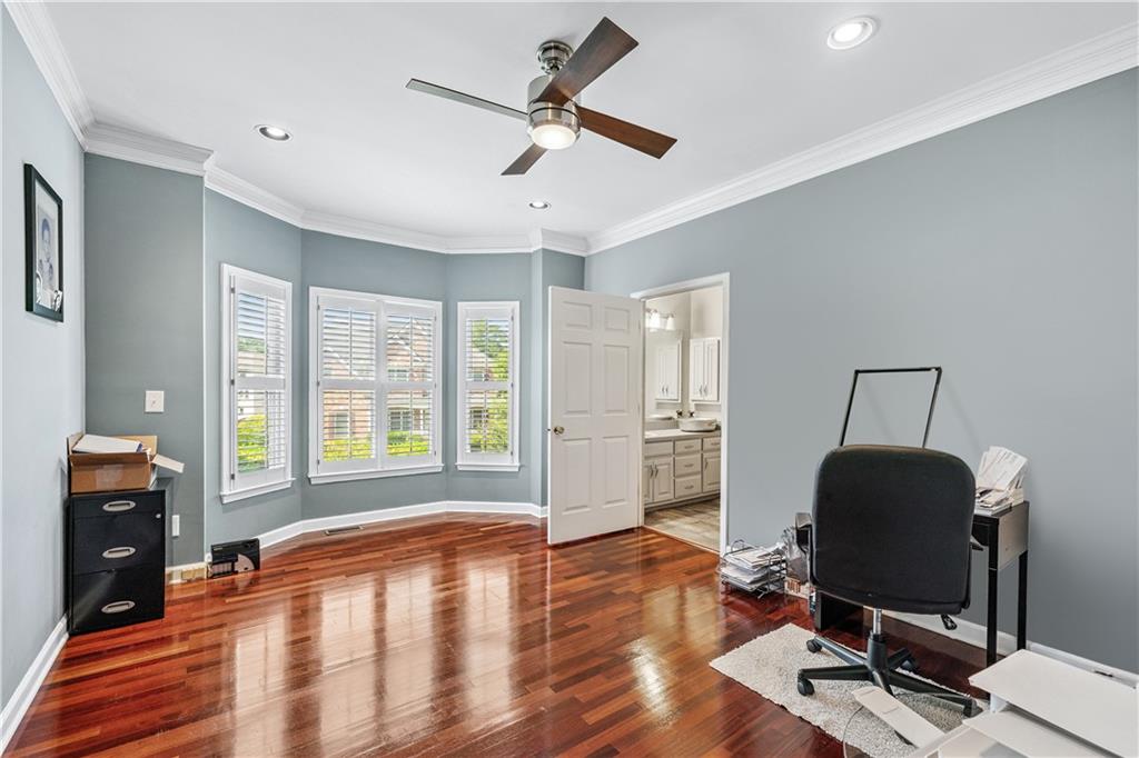 2012 Arbor Springs Way Buford, GA 30519 - Photo 18 of 61 a workspace with wooden floor and windows