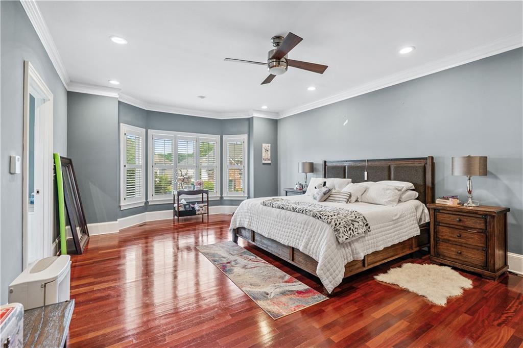 2012 Arbor Springs Way Buford, GA 30519 - Photo 21 of 61 a spacious bedroom with a large bed and a large window