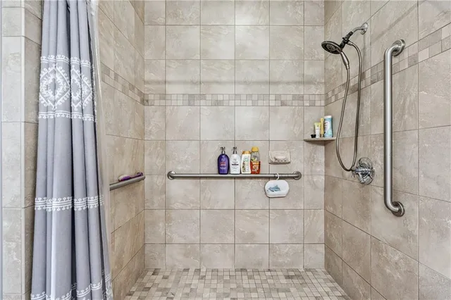 a view of a room with shelf on the wall