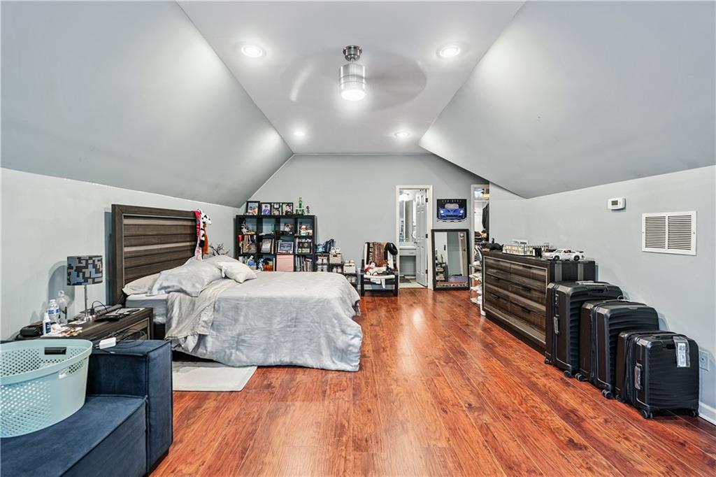 2012 Arbor Springs Way Buford, GA 30519 - Photo 26 of 61 a living room with furniture and a wooden floor