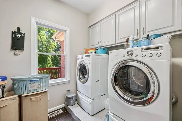 a view of a house with a yard and plants