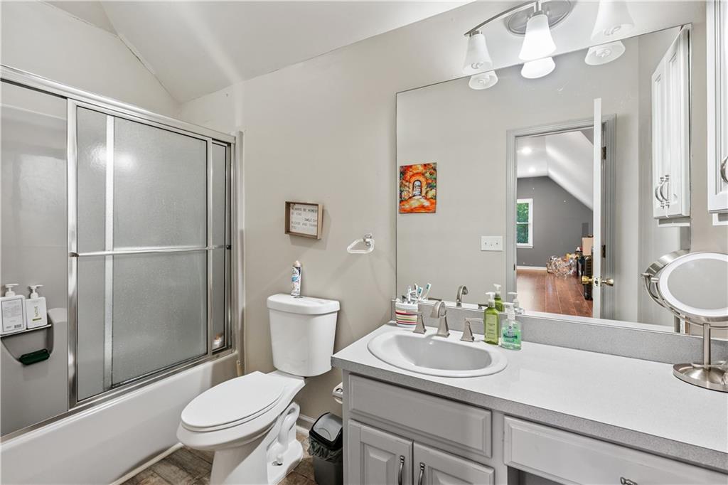 2012 Arbor Springs Way Buford, GA 30519 - Photo 29 of 61 a bathroom with a sink toilet and shower