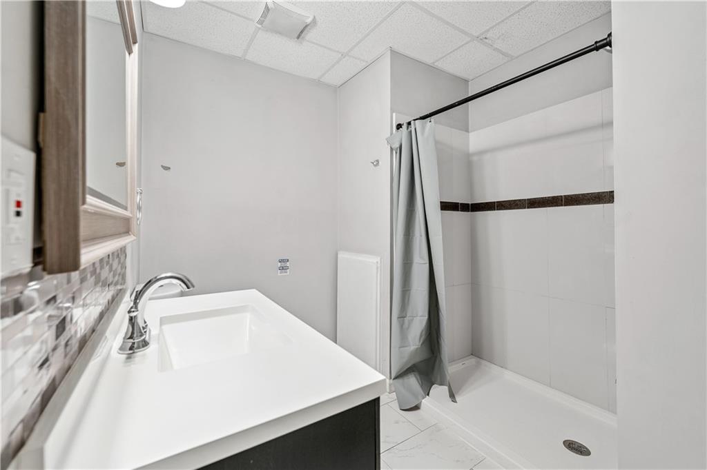 2012 Arbor Springs Way Buford, GA 30519 - Photo 35 of 61 a bathroom with a sink and a mirror