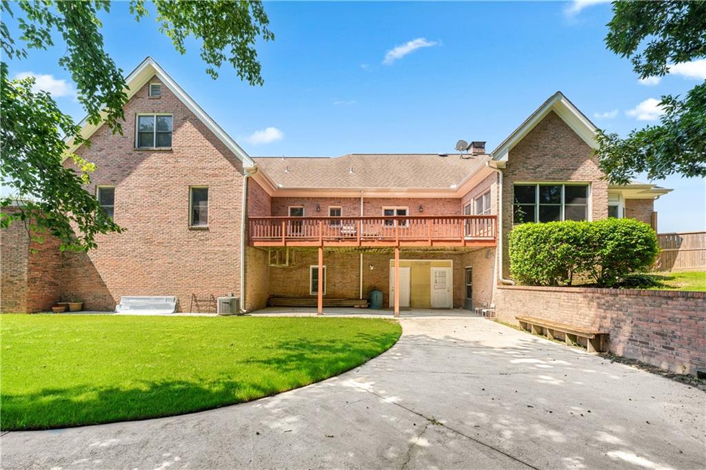 2012 Arbor Springs Way Buford, GA 30519 - Photo 44 of 61 a view of a house with a yard and plants