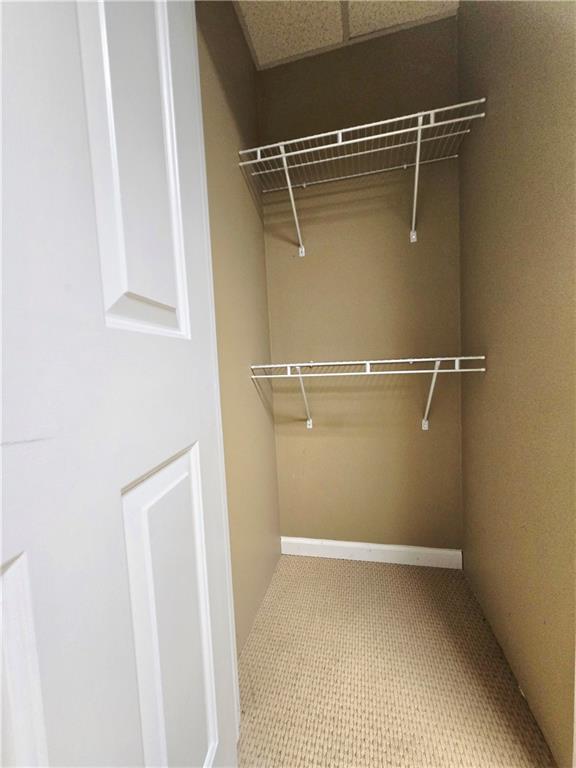 2012 Arbor Springs Way Buford, GA 30519 - Photo 46 of 61 a view of an empty walk in closet
