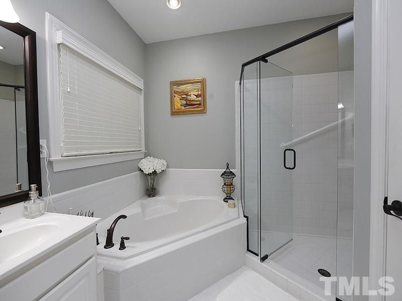 4228 Glen Erin Way Raleigh, NC 27613 - Photo 14 of 24 New glass shower surround!