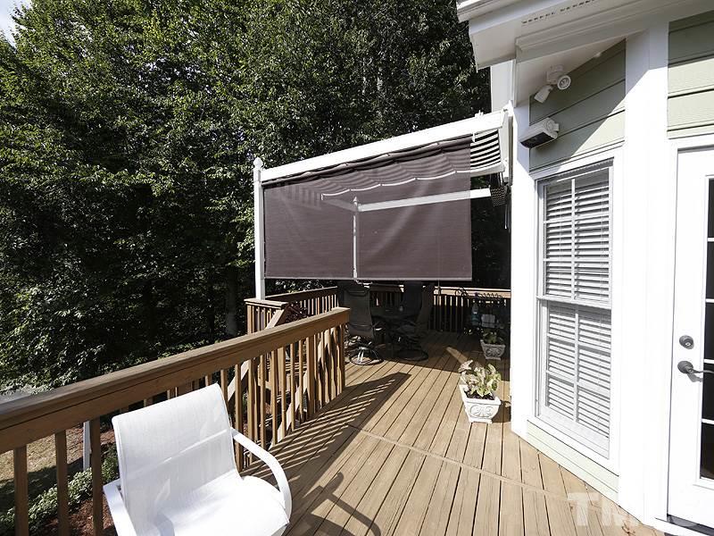 4228 Glen Erin Way Raleigh, NC 27613 - Photo 22 of 24 Screens that come down for sun block!