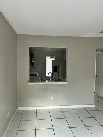 a kitchen with a stove and a sink
