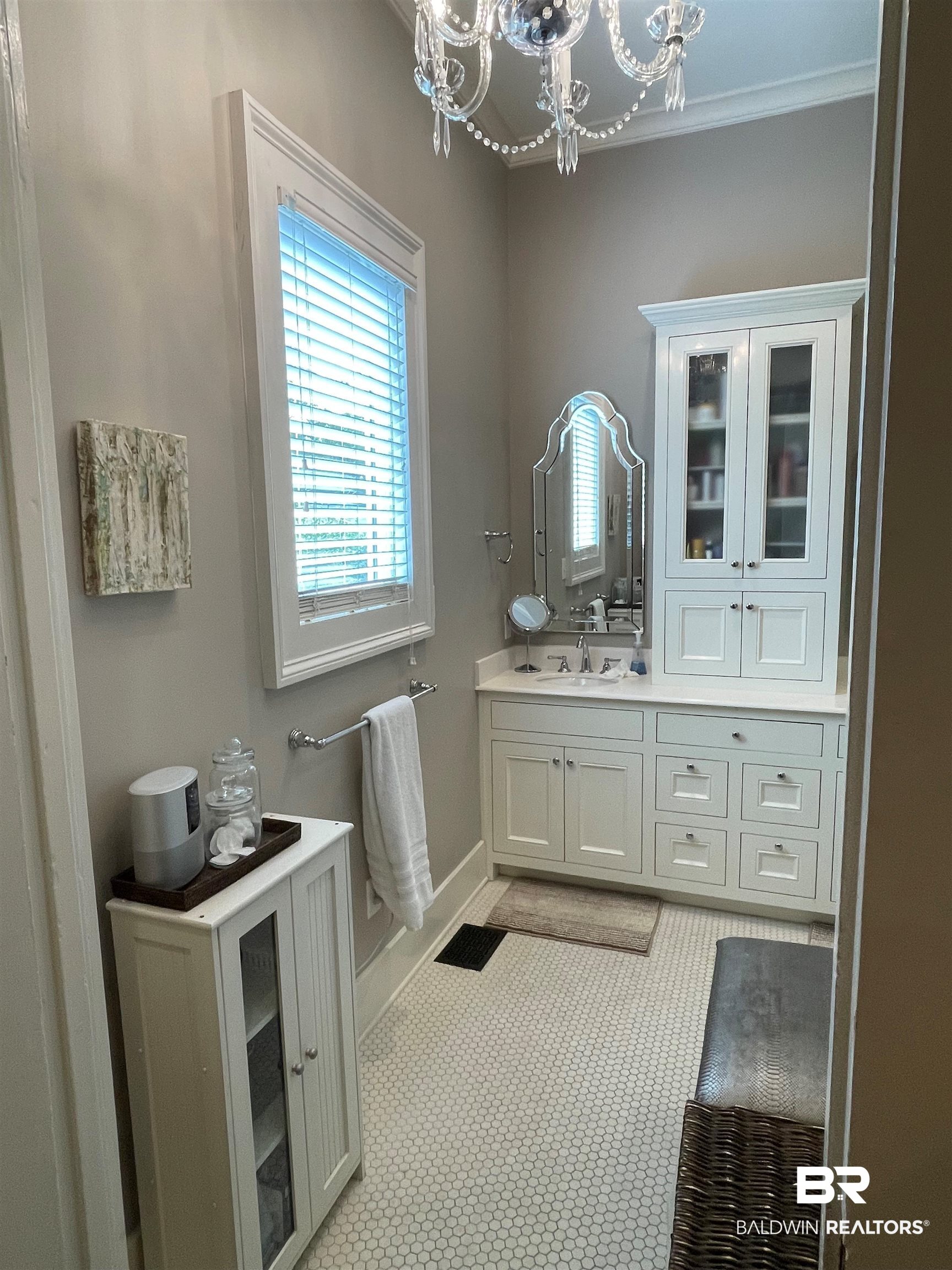 1001 Augusta Street Mobile, AL 36604 - Photo 17 of 26 Bathroom with vanity and a notable chandelier