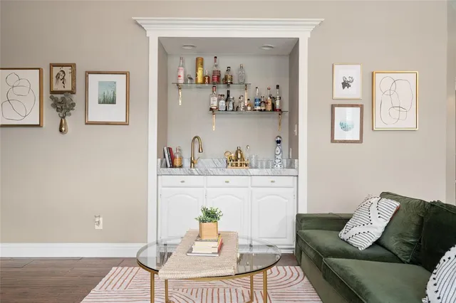 a living room with furniture and window