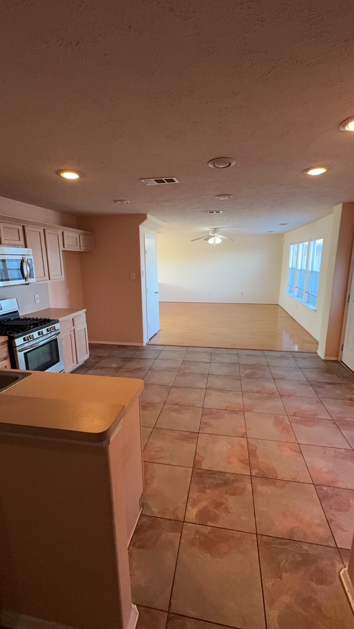 6014 Pinacle Point Houston, TX 77085 - Photo 14 of 27 a view of a room with gym equipment