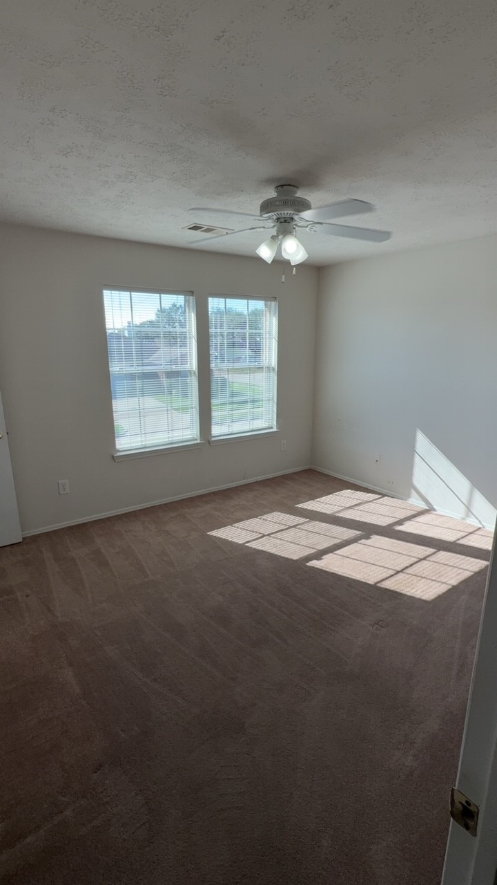 6014 Pinacle Point Houston, TX 77085 - Photo 18 of 27 a view of empty room with window