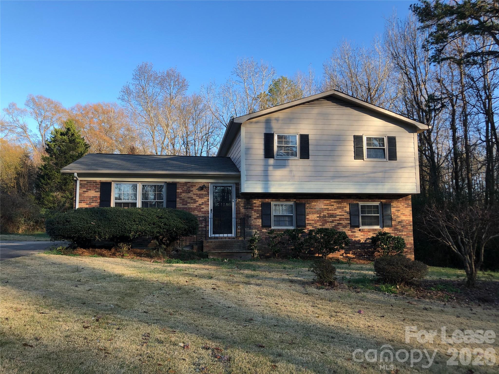 315 Pine Road Mount Holly, NC 28120 - Photo 1 of 21 a view of a yard in front of a house