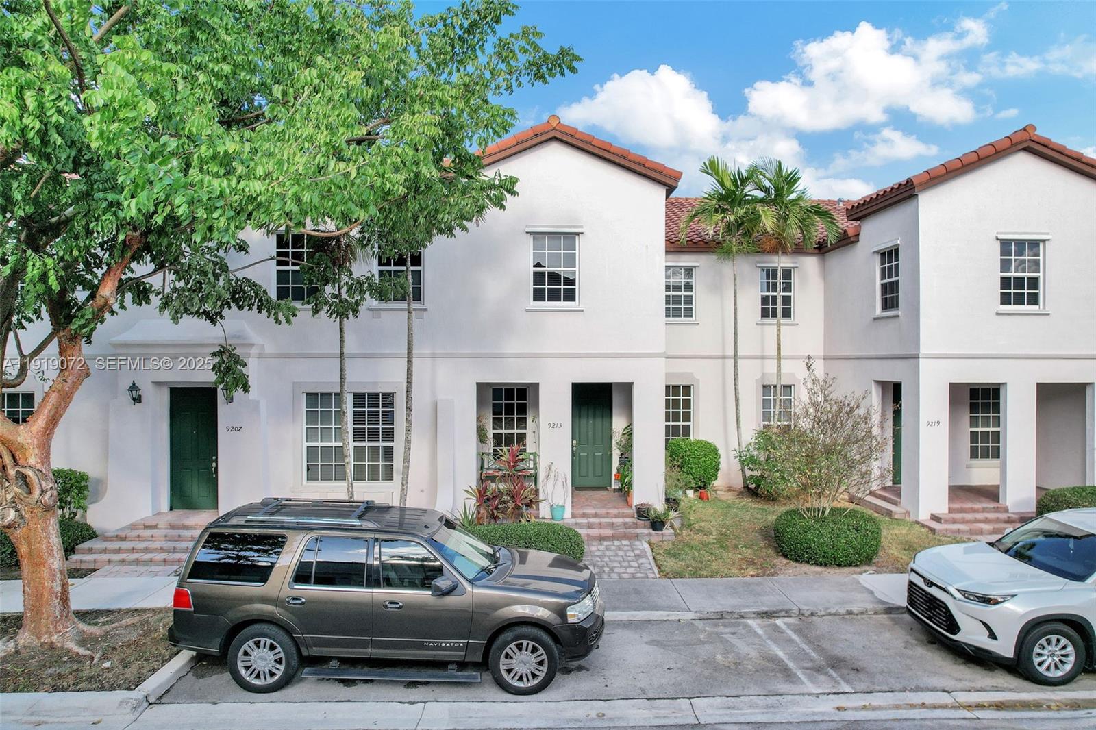 9213 Southwest 170th Avenue Miami, FL 33196 - Photo 22 of 82 a car parked in front of a house