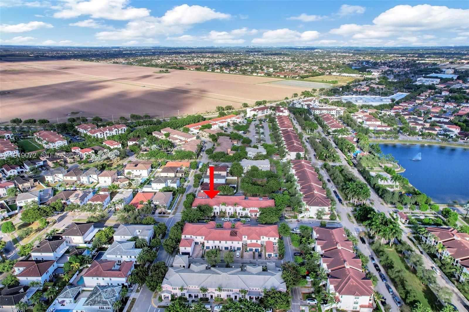9213 Southwest 170th Avenue Miami, FL 33196 - Photo 25 of 82 an aerial view of city and lake