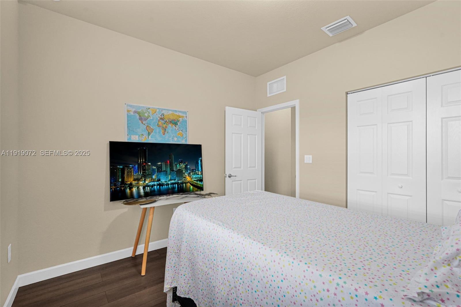 9213 Southwest 170th Avenue Miami, FL 33196 - Photo 59 of 82 a bedroom with a bed and a fireplace