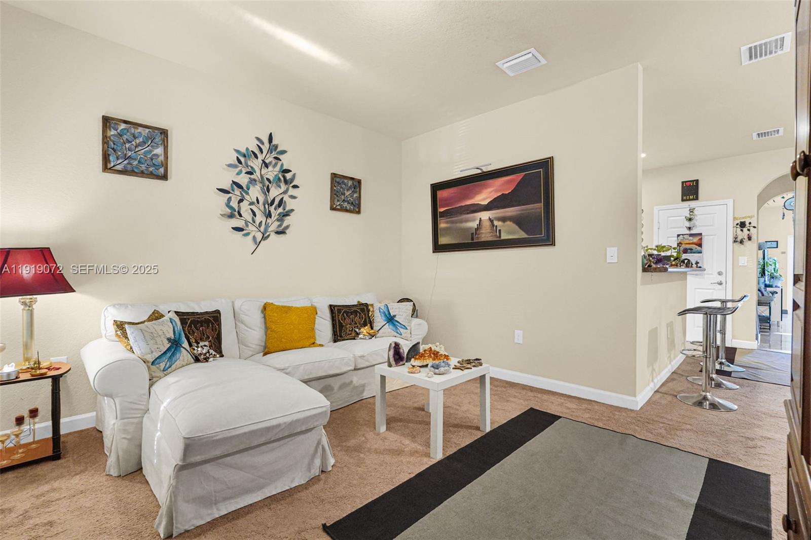 9213 Southwest 170th Avenue Miami, FL 33196 - Photo 69 of 82 a living room with furniture and a couch