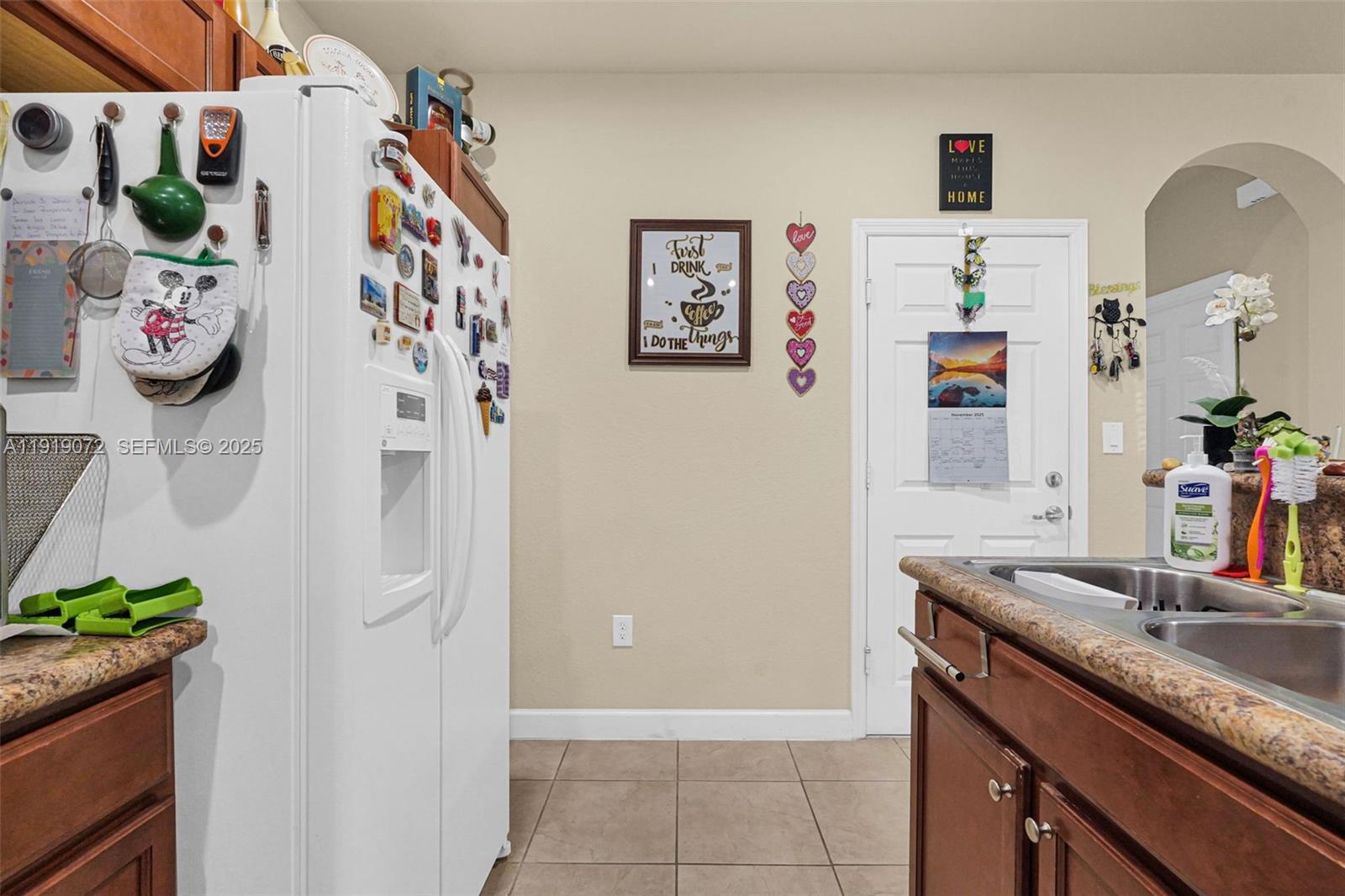 9213 Southwest 170th Avenue Miami, FL 33196 - Photo 81 of 82 a bathroom with a granite countertop sink and a mirror