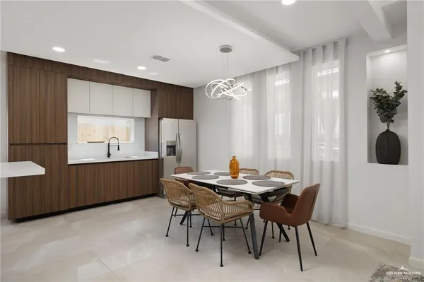 a view of a dining room with furniture and window