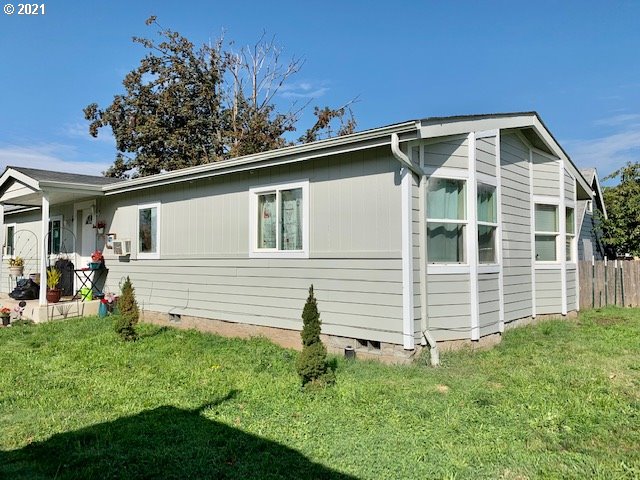 205 57th Street Springfield, OR 97478 - Photo 12 of 13 a view of a house with a yard