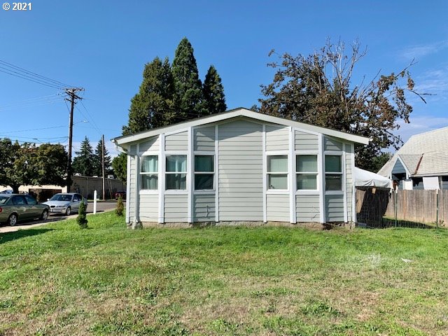 205 57th Street Springfield, OR 97478 - Photo 13 of 13 a view of a house with a yard