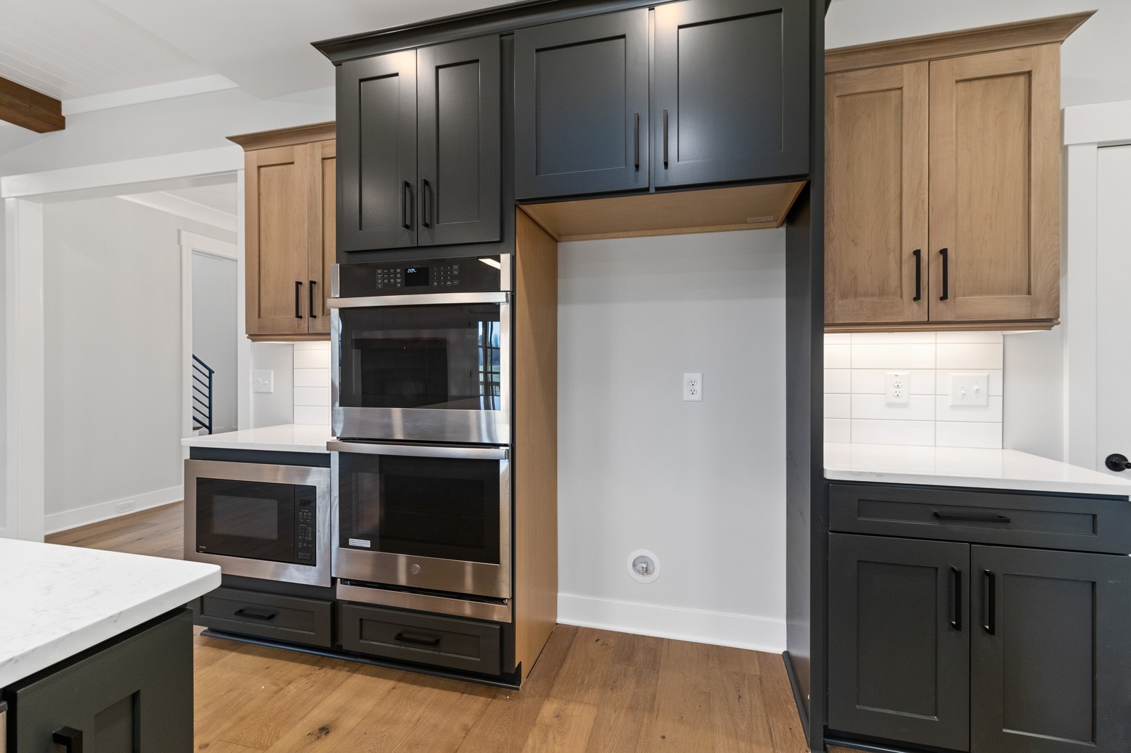 24 Port Royal Estate Adams, TN 37010 - Photo 13 of 34 a kitchen with granite countertop white cabinets and stainless steel appliances