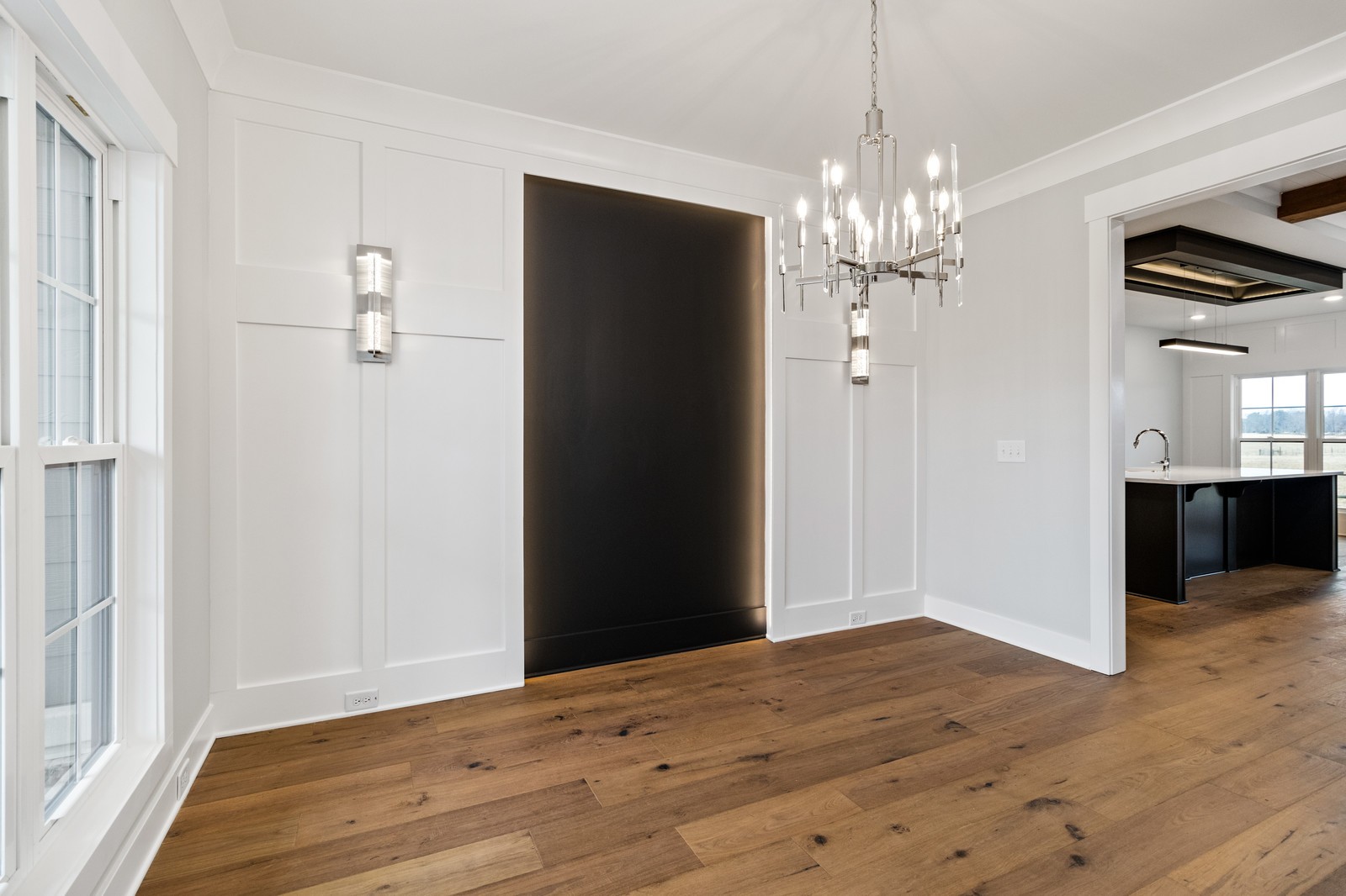 24 Port Royal Estate Adams, TN 37010 - Photo 14 of 34 a view of a chandelier in big room with wooden floor and staircase
