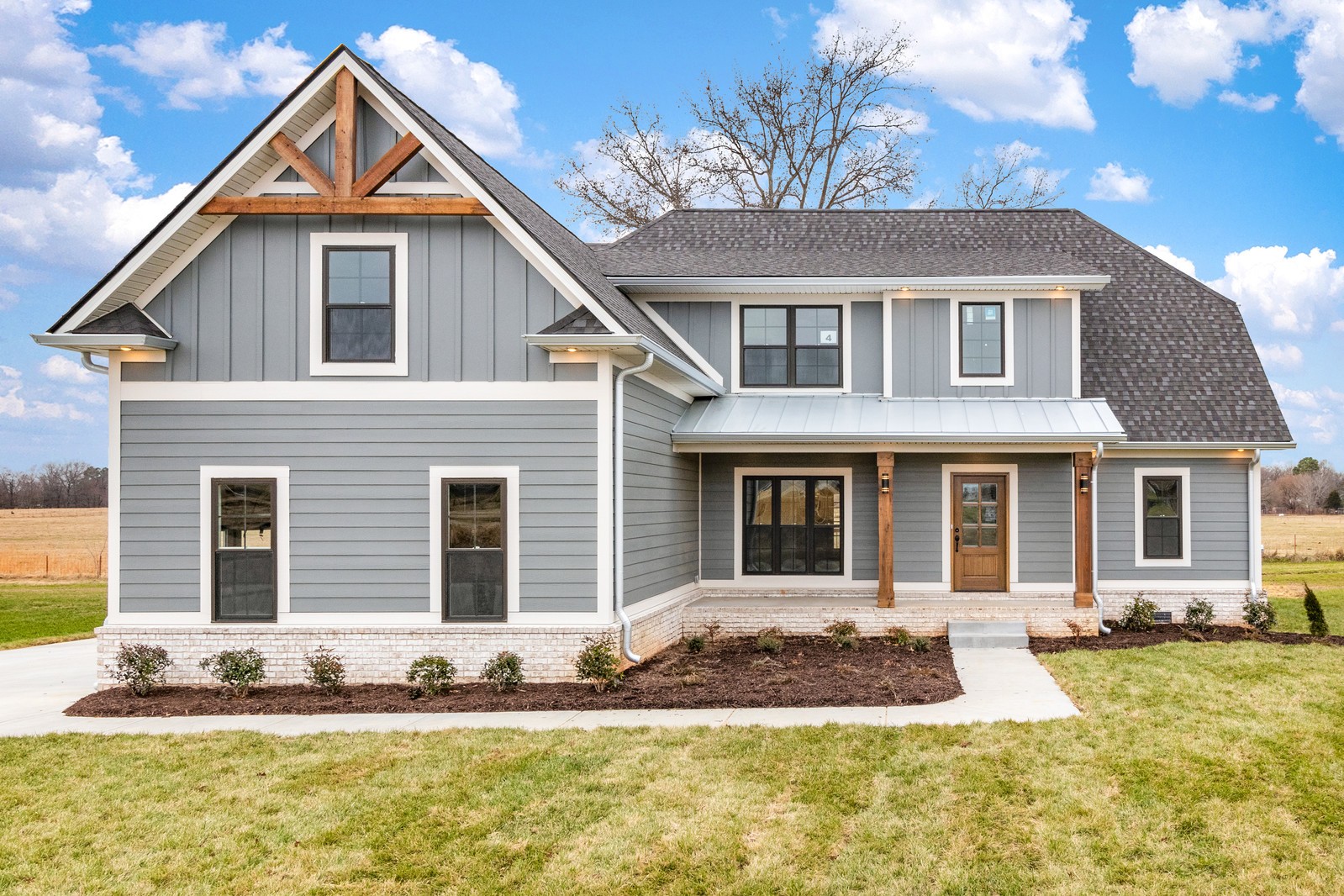 24 Port Royal Estate Adams, TN 37010 - Photo 4 of 34 a front view of a house with a yard