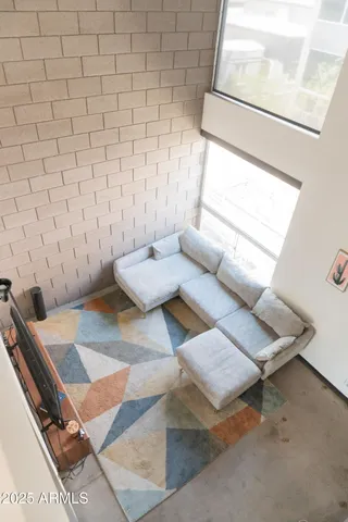 view of living room with furniture and a window