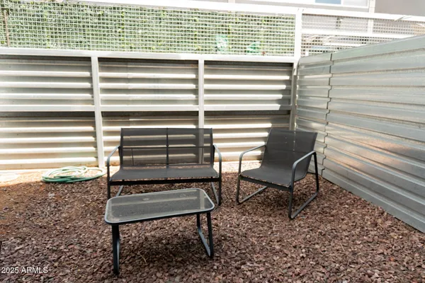 a bench sitting in front of a house