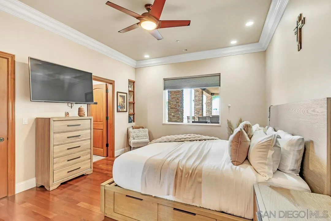 10321 Hitching Post Way Santee, CA 92071 - Photo 31 of 75 a bedroom with a bed and furniture