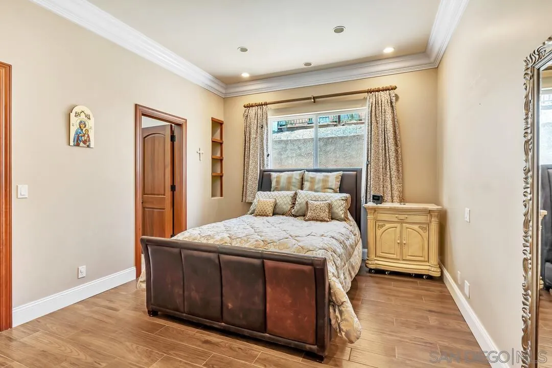 10321 Hitching Post Way Santee, CA 92071 - Photo 36 of 75 a bedroom with a bed and a window