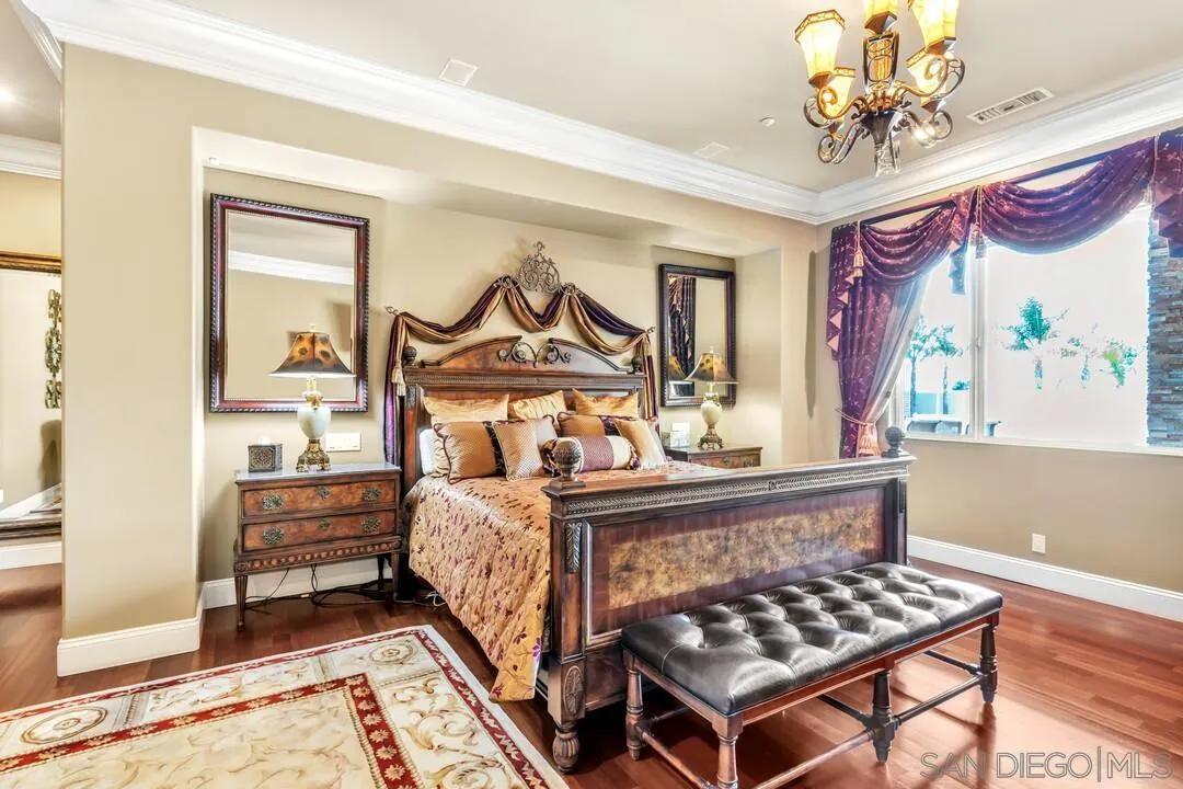 10321 Hitching Post Way Santee, CA 92071 - Photo 45 of 75 a bedroom with a bed and a dresser with mirror