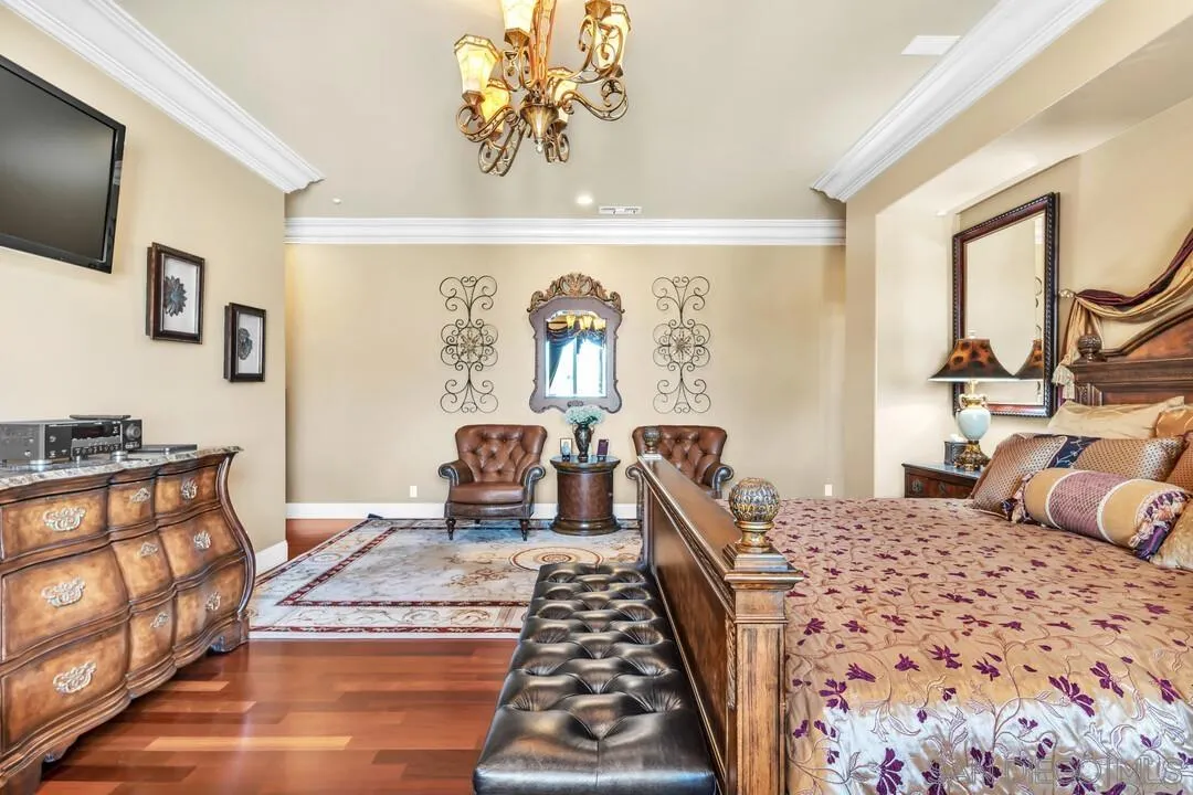 10321 Hitching Post Way Santee, CA 92071 - Photo 46 of 75 a bedroom with a bed and wooden floor