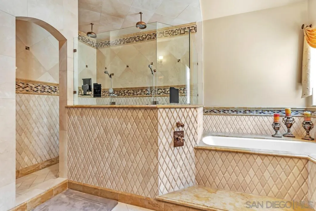 10321 Hitching Post Way Santee, CA 92071 - Photo 50 of 75 a view of a bathroom with a tub and a window