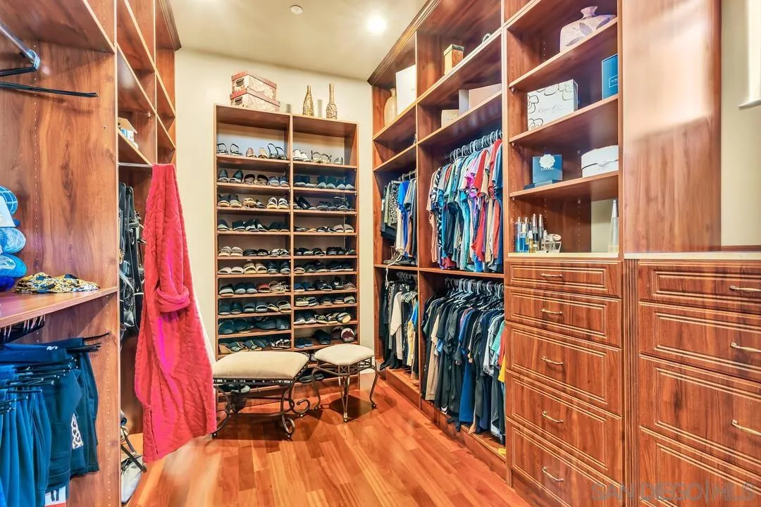 10321 Hitching Post Way Santee, CA 92071 - Photo 52 of 75 a view of walk in closet with clothes and shoes