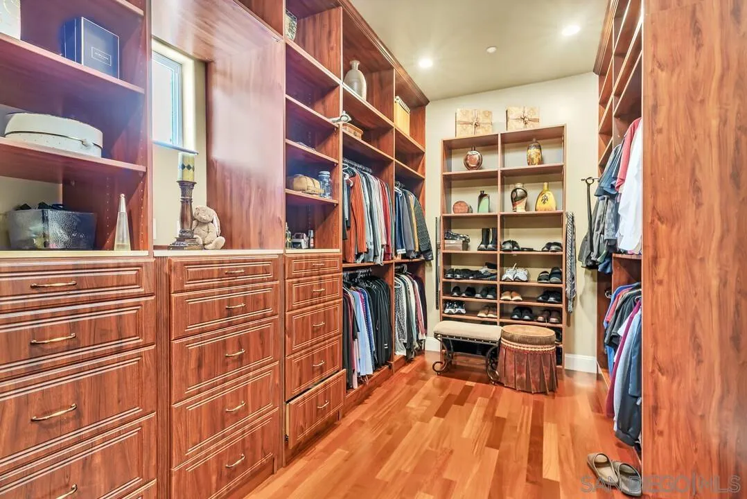 10321 Hitching Post Way Santee, CA 92071 - Photo 53 of 75 a view of walk in closet with clothes and shoes