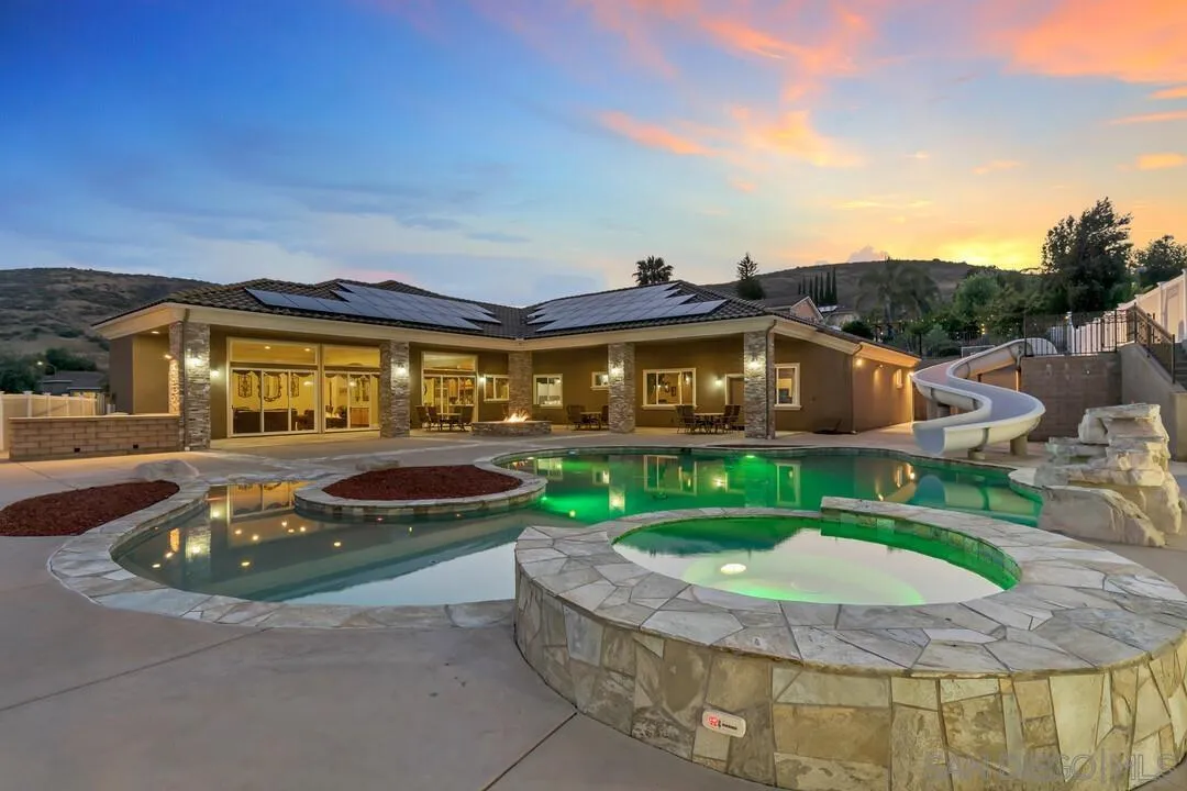 10321 Hitching Post Way Santee, CA 92071 - Photo 54 of 75 a front view of house with yard and outdoor seating