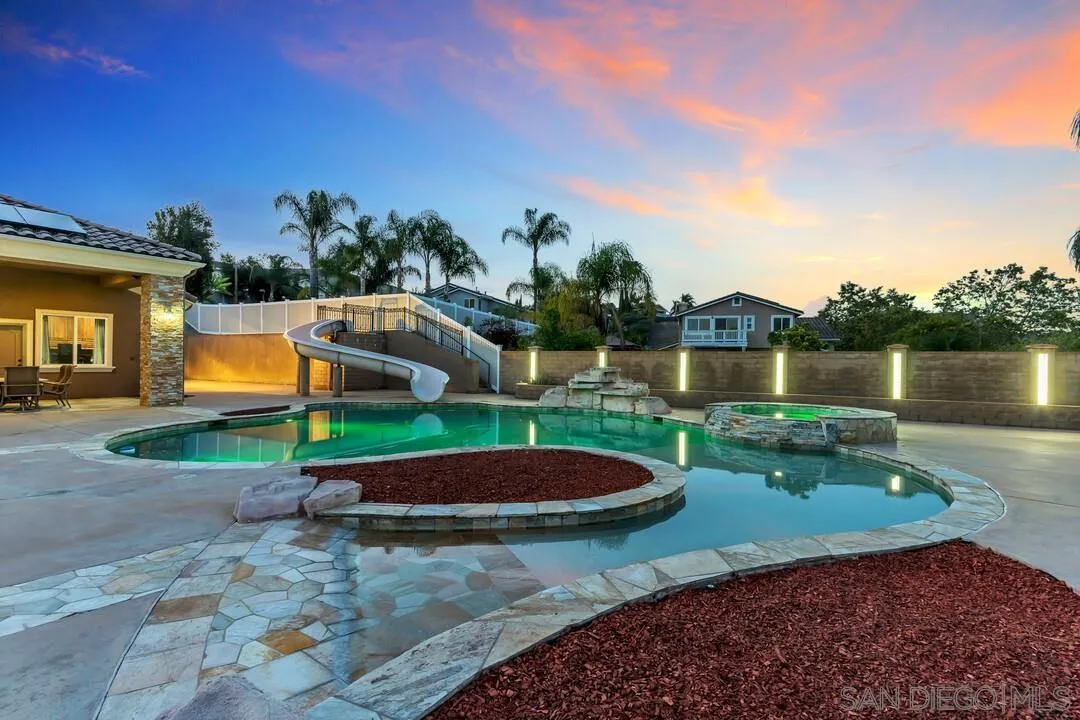 10321 Hitching Post Way Santee, CA 92071 - Photo 55 of 75 a view of a swimming pool with a yard