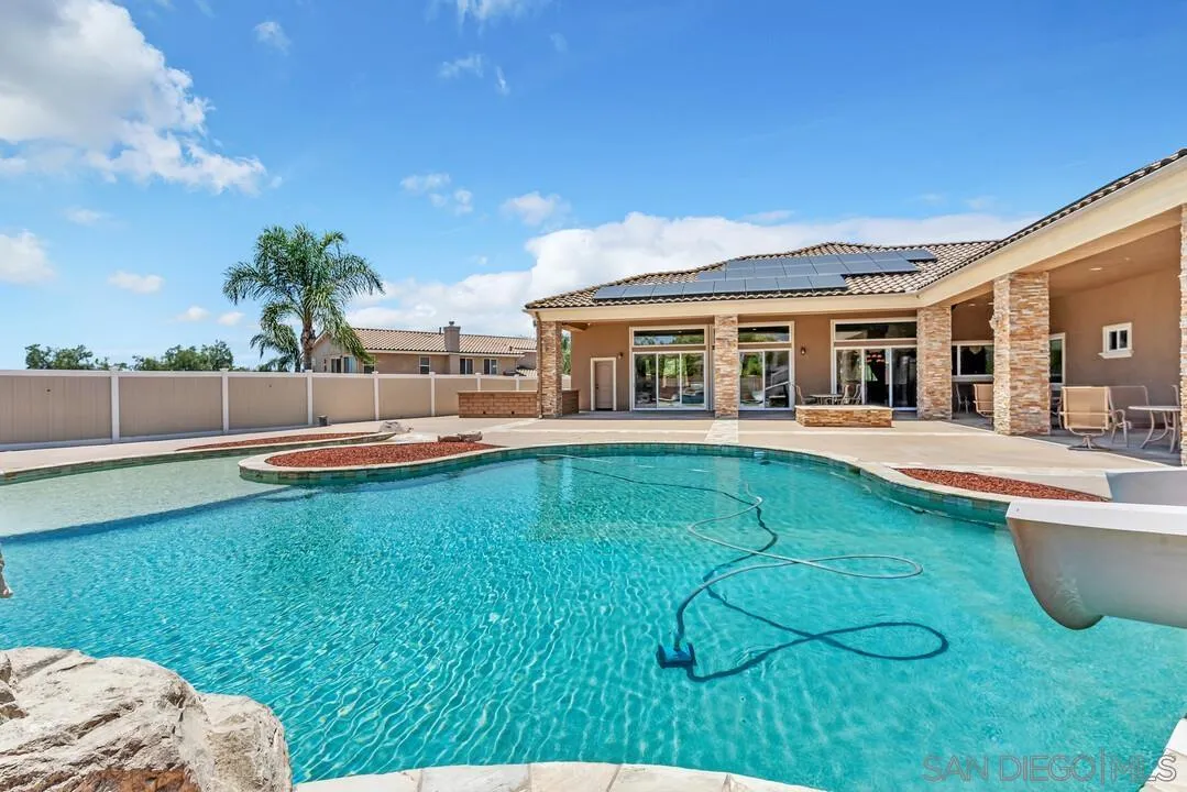 10321 Hitching Post Way Santee, CA 92071 - Photo 66 of 75 a view of a house with swimming pool and sitting area