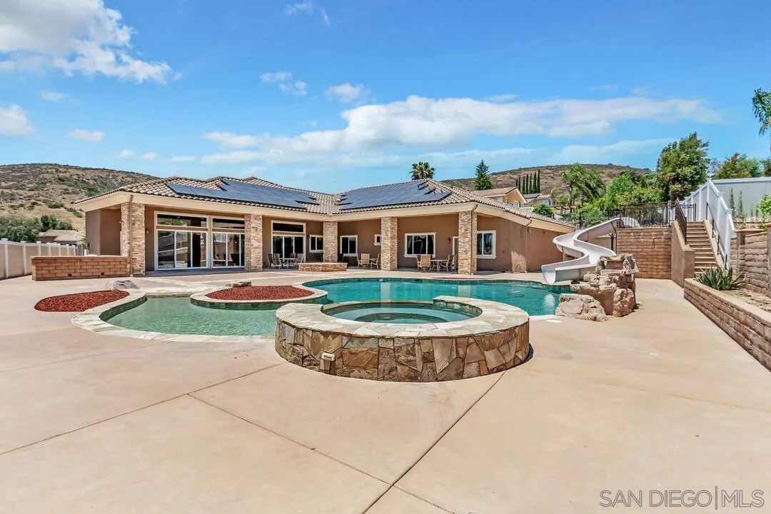 10321 Hitching Post Way Santee, CA 92071 - Photo 69 of 75 front view of a house with a garden