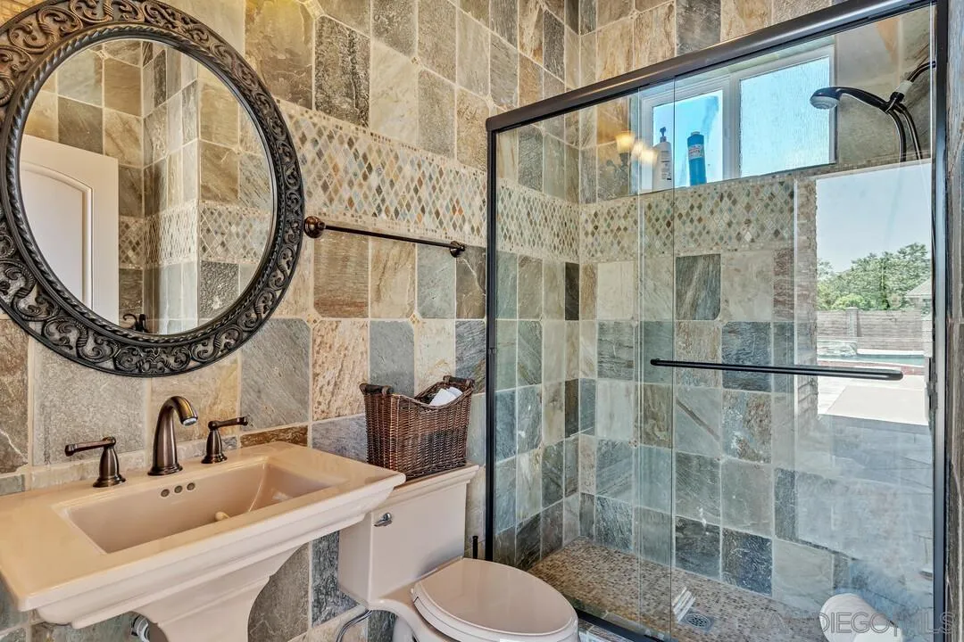 10321 Hitching Post Way Santee, CA 92071 - Photo 71 of 75 a bathroom with a sink and a mirror