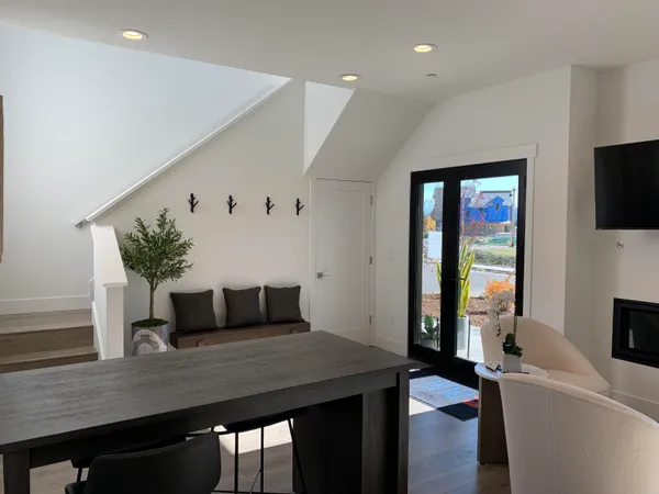 a view of a room with a potted plant