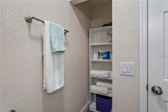 a room that has a bed and a closet in it