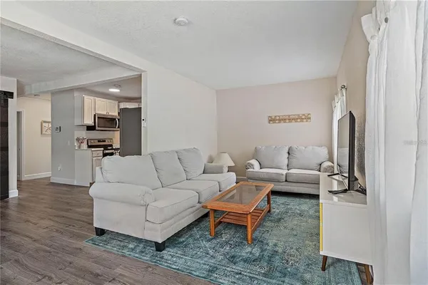 a living room with furniture and a couch