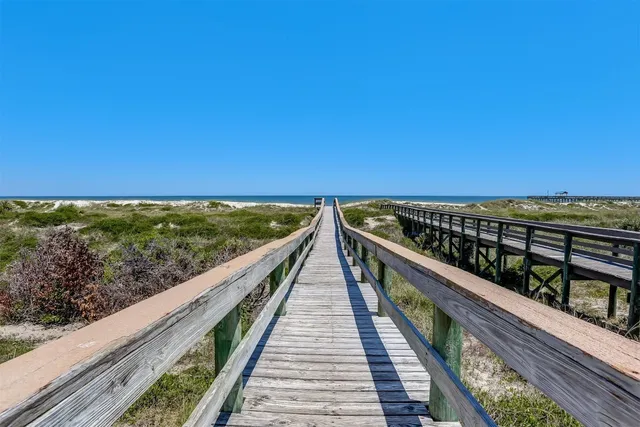 a view of balcony with wooden floor and city view