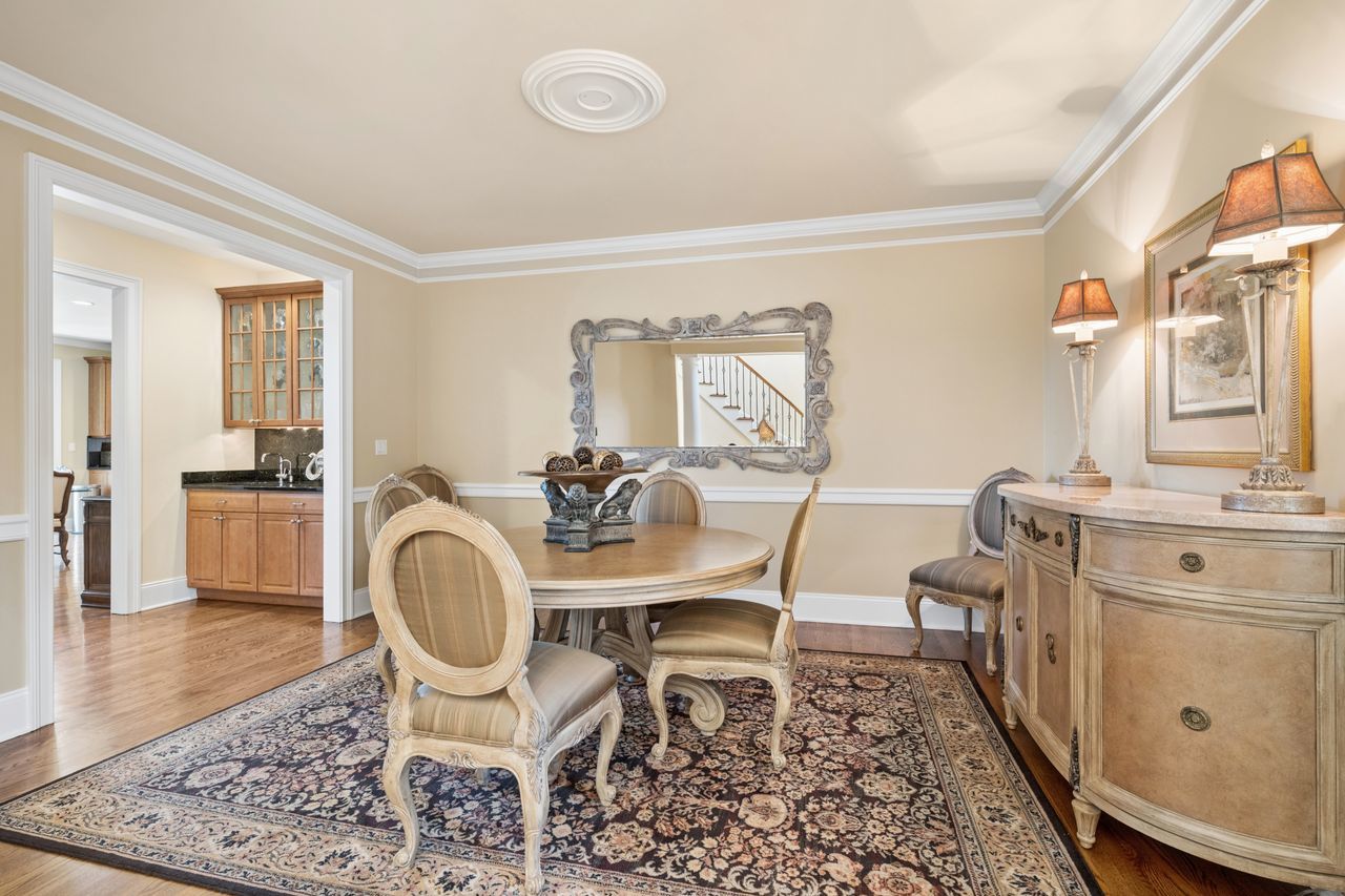 1029 Ridgeview Drive Inverness, IL 60010 - Photo 9 of 58 a view of a dining room with furniture and wooden floor