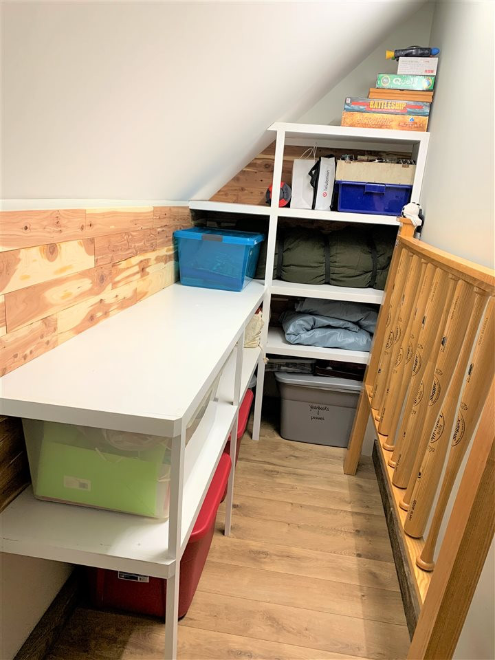 8512 Wheeling Drive Raleigh, NC 27615 - Photo 29 of 30 Custom cedar storage closet located in the bonus room. This storage space is very large and useful for all your toys and extra items. Cedar closet