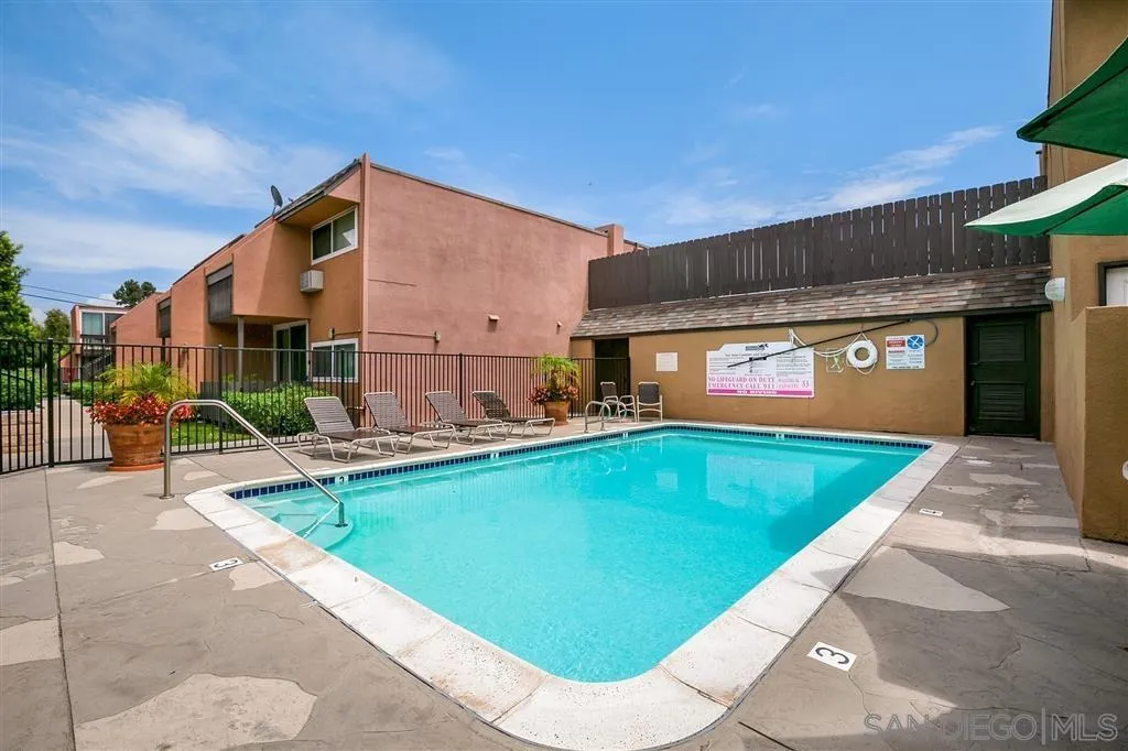 6555 Mt Ada Road, Unit 222 San Diego, CA 92111 - Photo 11 of 12 a view of a house with swimming pool and sitting area