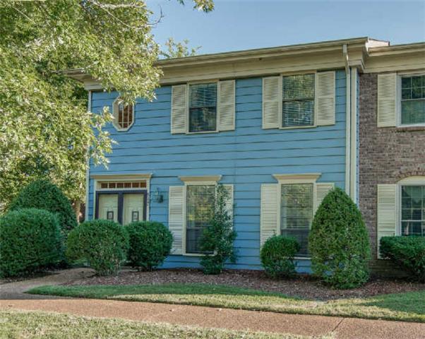 892 General George Patton Road, Unit 892 Nashville, TN 37221 - Photo 1 of 20 a front view of a house with garden